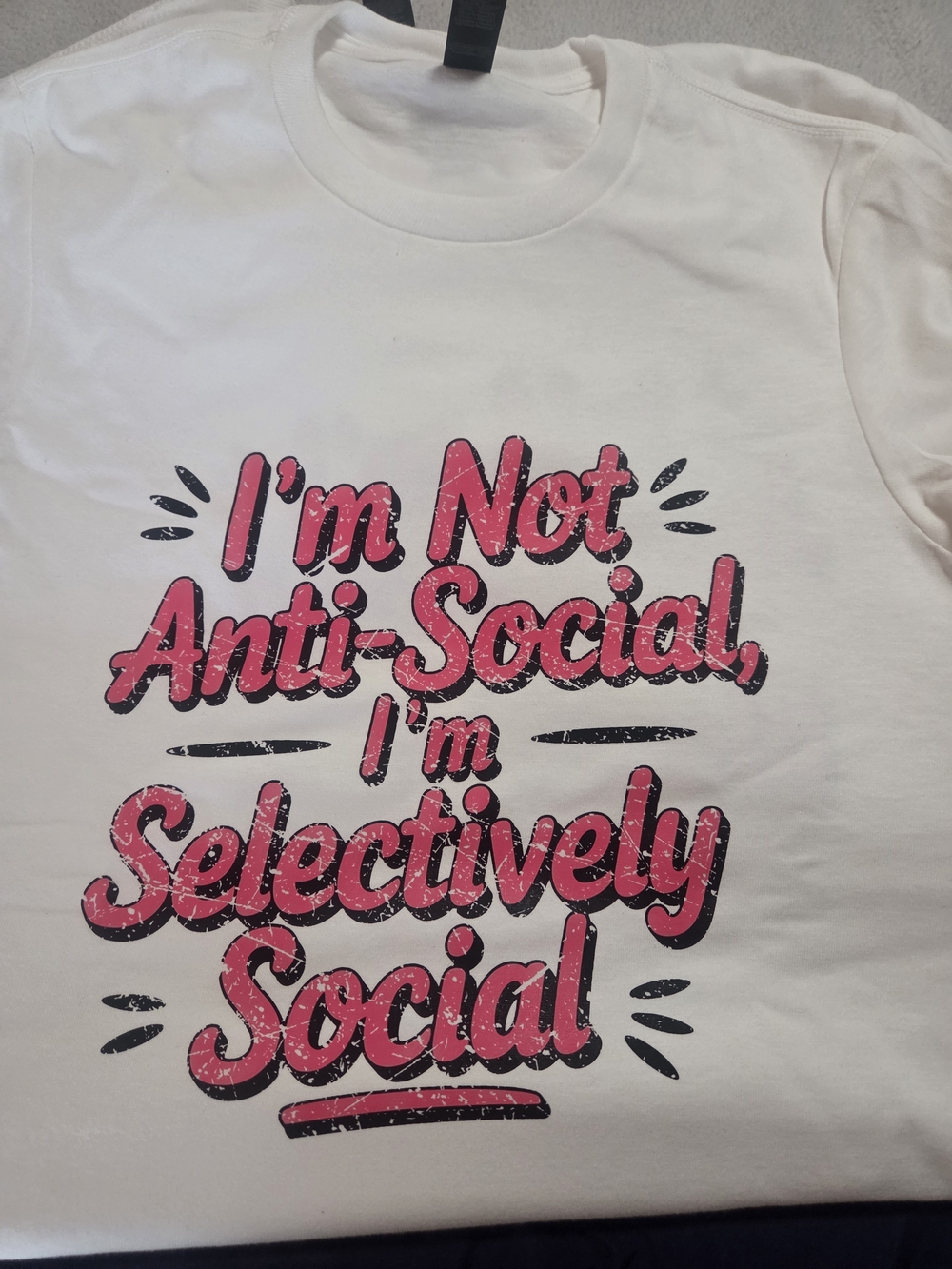 White Graphic Tee with Pink Retro Script Saying